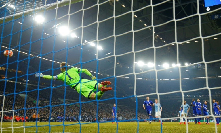 Schalke's German goalkeeper Ralf Faehrmann is beaten by Leroy Sane's stunning free-kick